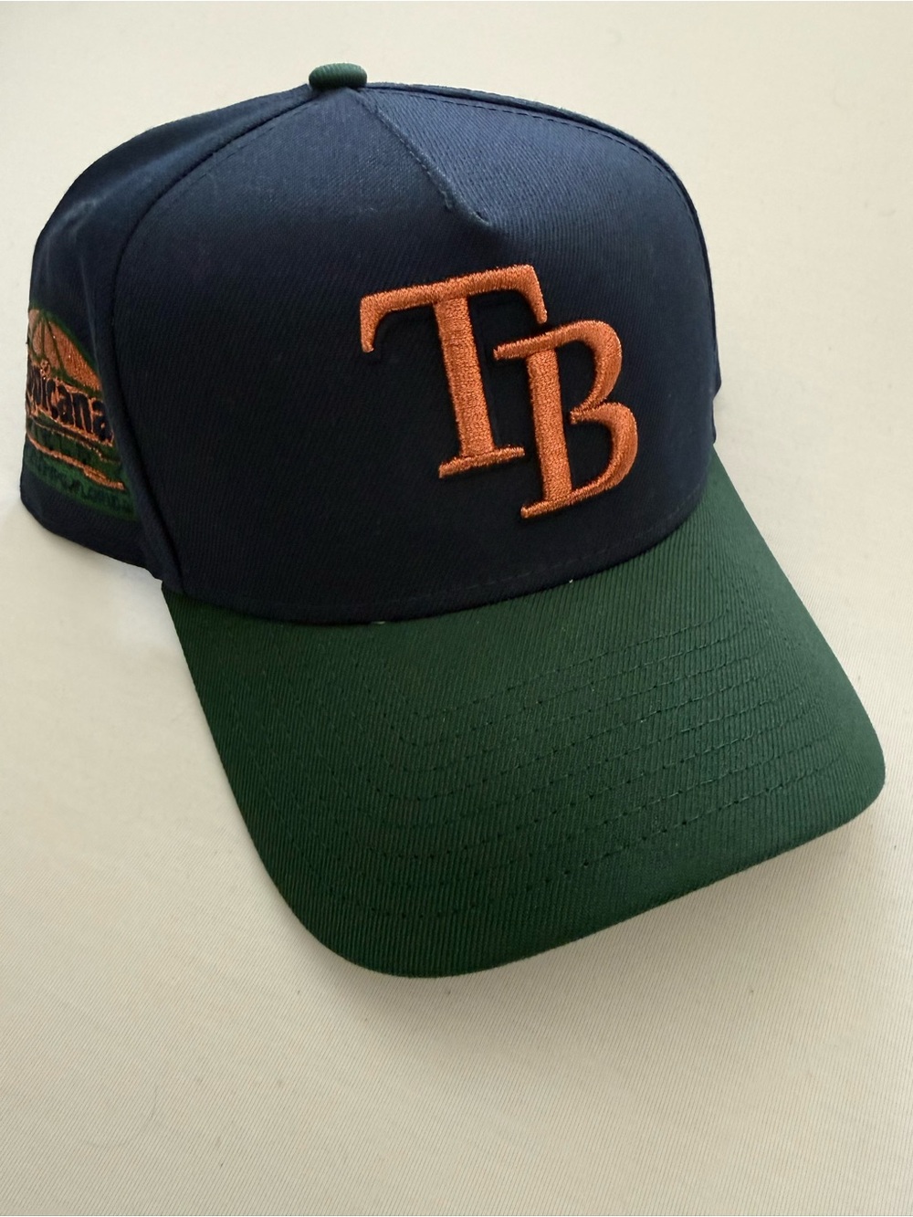 New Era Navy & Green TB Logo Baseball Cap with Orange Embroidery